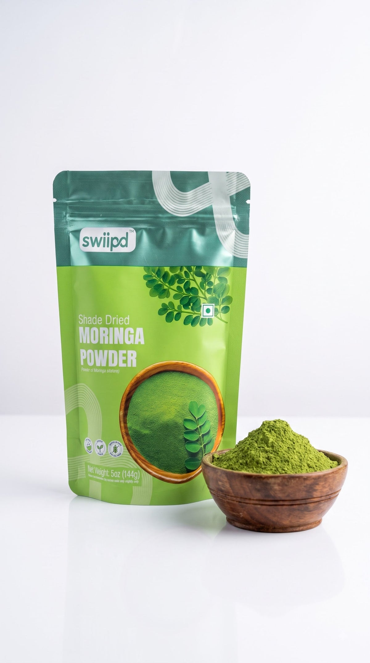 SWIIPD moringa leaf powder pouch with loose green moringa powder